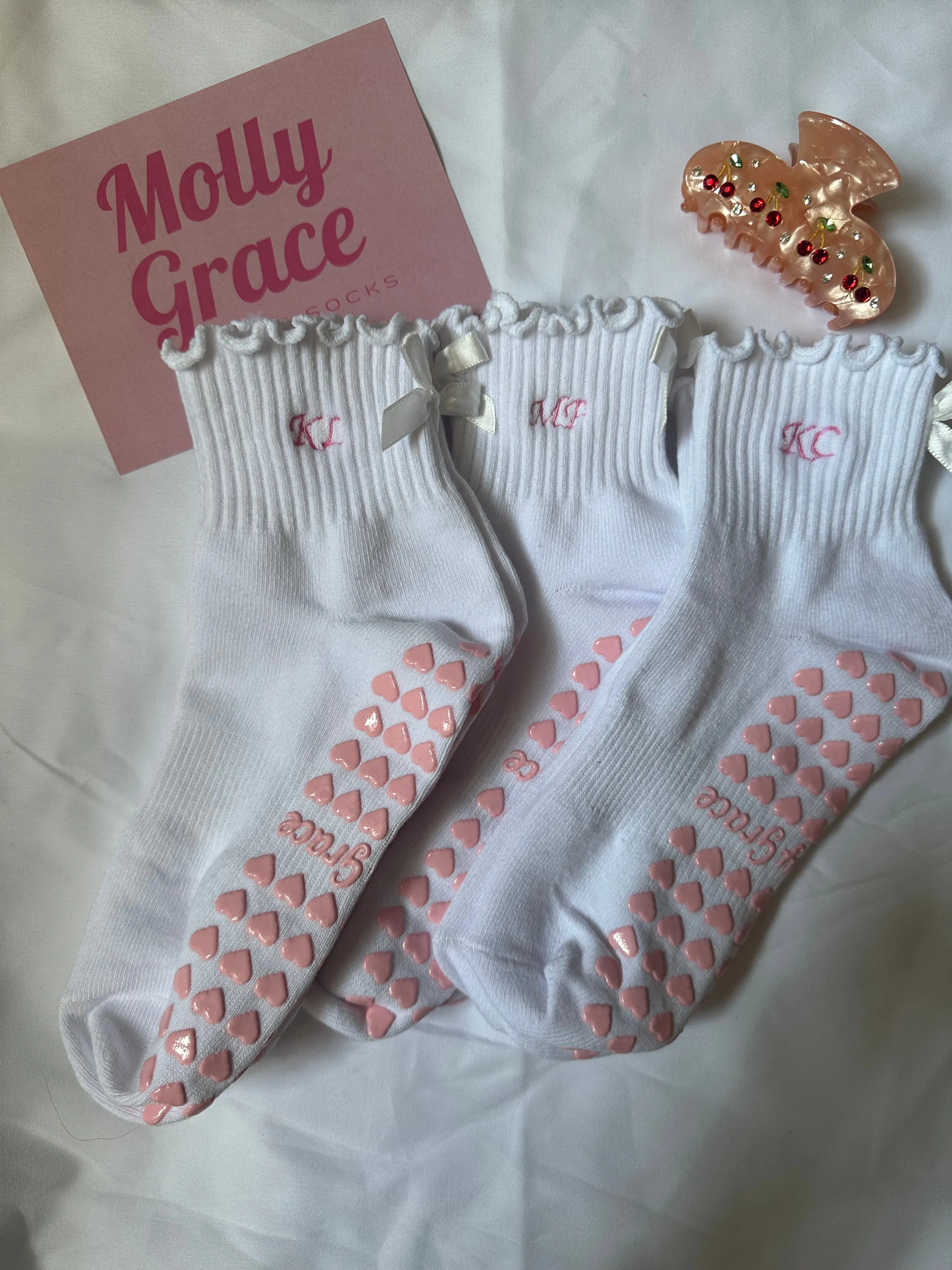 Custom initial white ruffle & white bow embroidered grip sock with pink heart grips